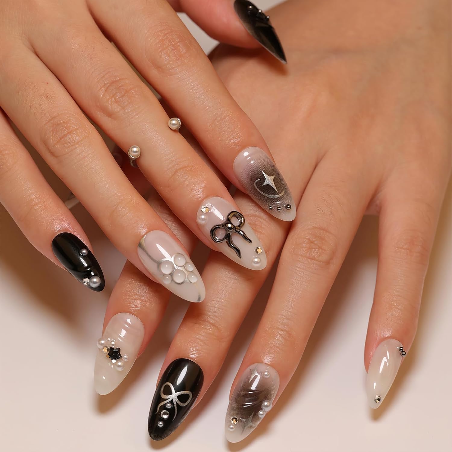 Black Press on Nails Medium Almond Fake Nails with 3D Bow Pearl Designs Glossy Black Gradient False Nails Y2K Silver Star Water Drops Full Cover Acrylic Nails Stick on Nails for Women 24Pcs - Image 2