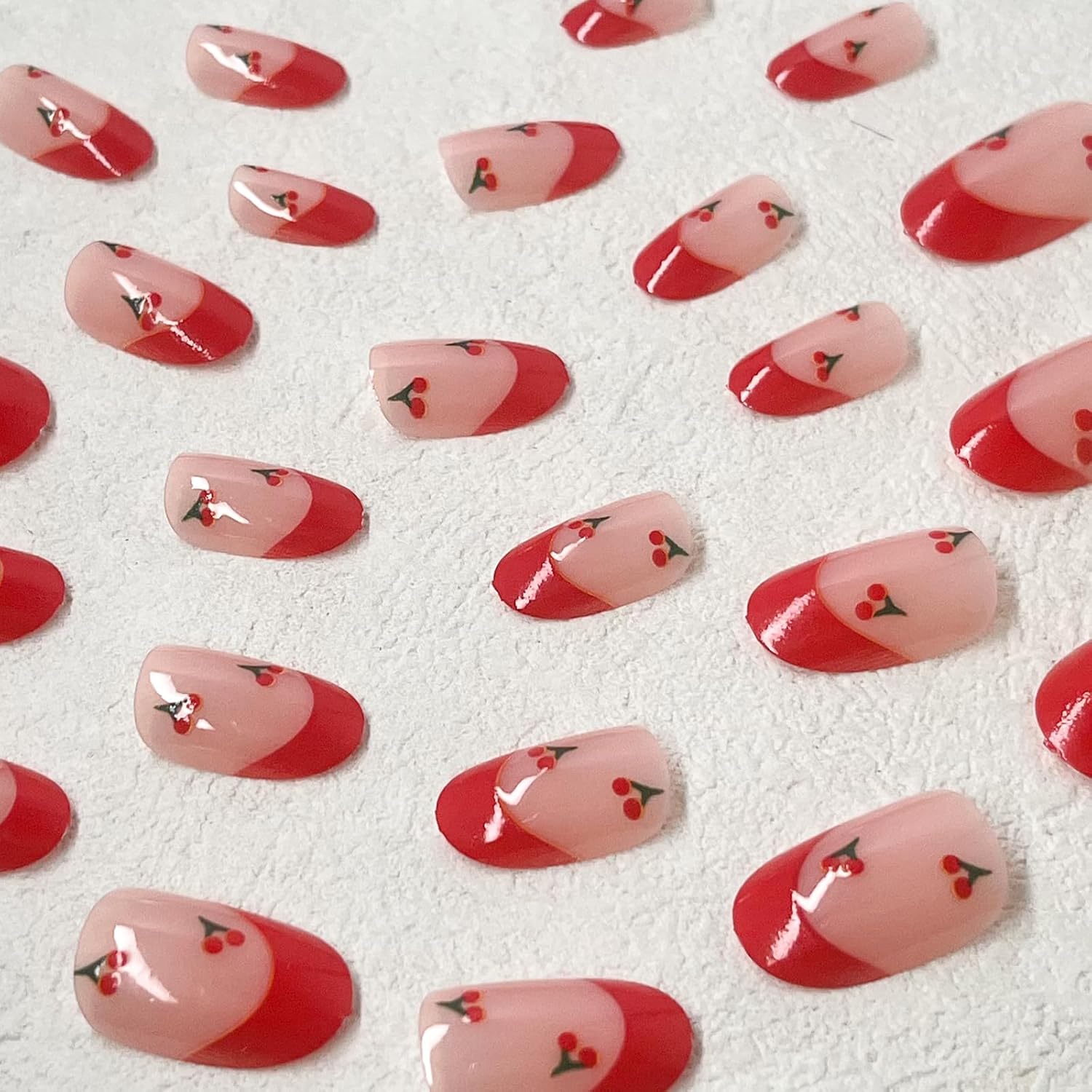 Red French Tip Press on Nails Almond Short Fake Nails Cute Nude Pink Full Cover Glue on Nails with Red Cherry Glossy Artificial Stick on Nails Reusable Acrylic False Nail for Women Girls 24Pcs - Image 4