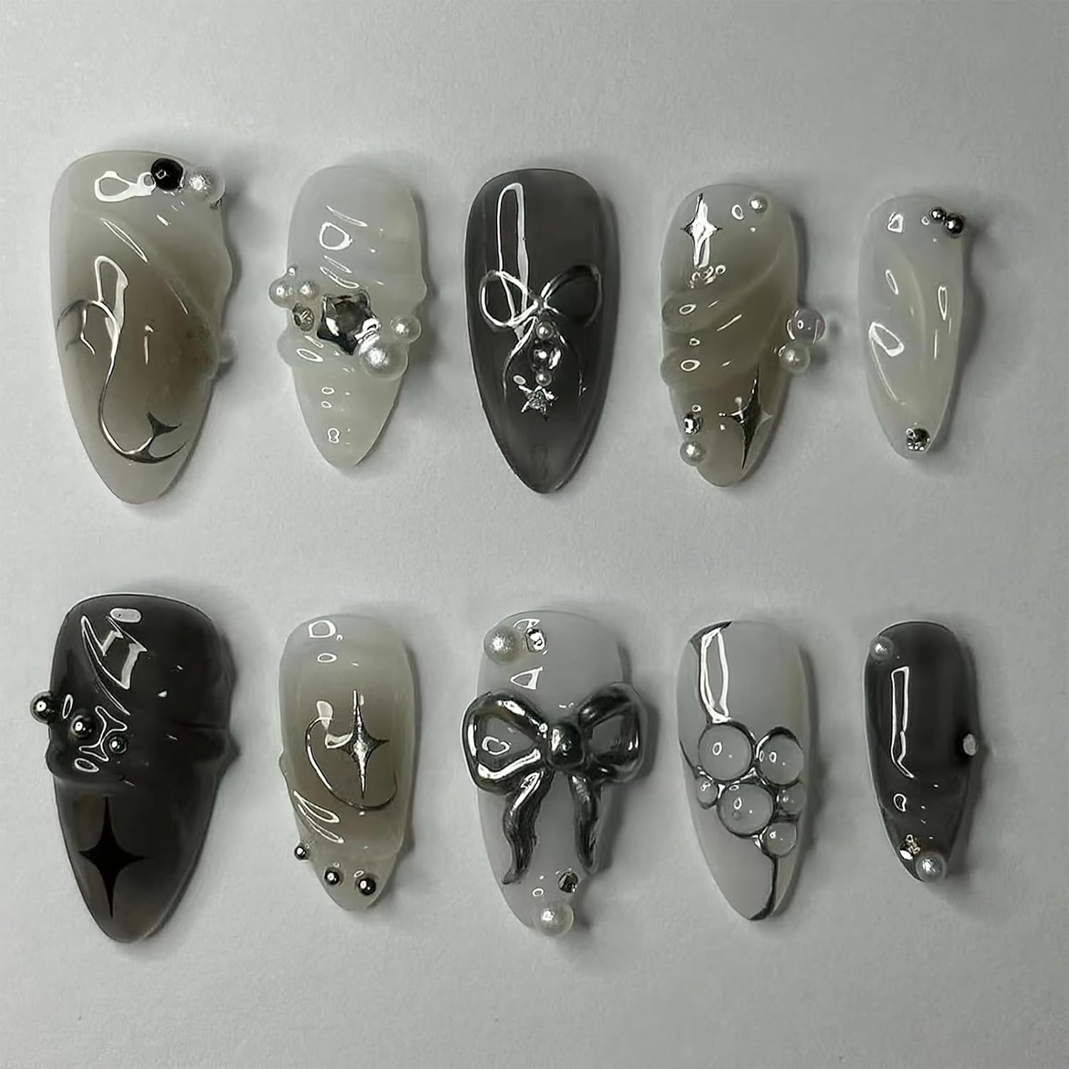 Black Press on Nails Medium Almond Fake Nails with 3D Bow Pearl Designs Glossy Black Gradient False Nails Y2K Silver Star Water Drops Full Cover Acrylic Nails Stick on Nails for Women 24Pcs