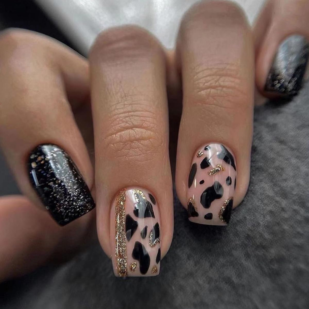 Medium Square Press on Nails Black Glitter Fake Nails Cow Print False Nails with Designs Gold Foil Acrylic Nails Full Cover Glitter Glue on Nails for Women 24pcs