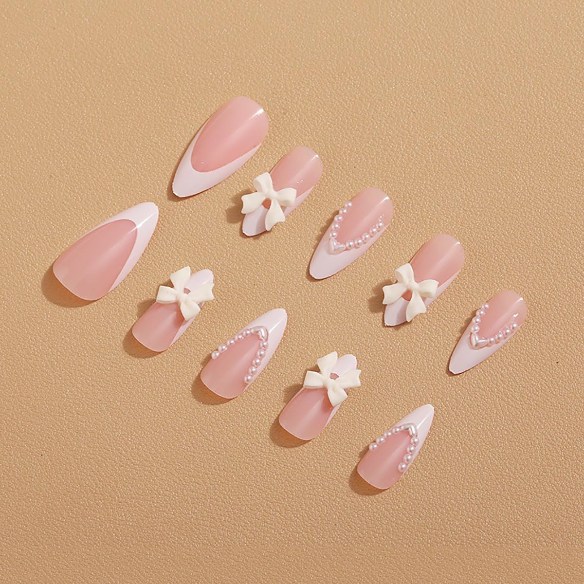 24-Piece Medium Almond White French Tip Press-On Nails with Pearl and Bow Accents - Image 2