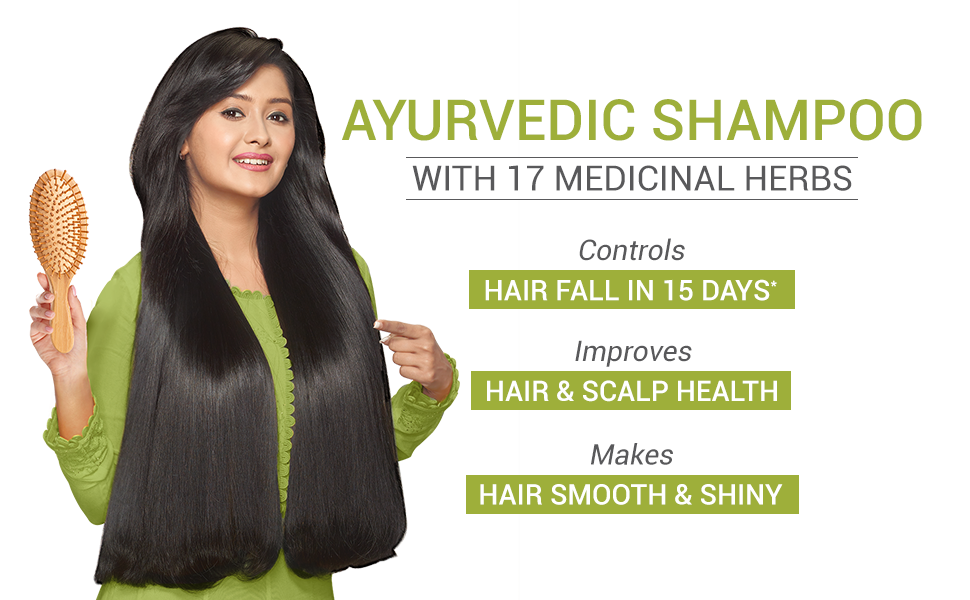 sesa ayurvedic medicinal shampoo 500ml lady with comb showing few hair on the comb