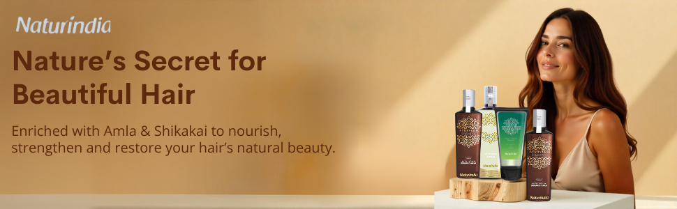 Woman with shiny, healthy hair next to Naturindia organic shampoo and conditioner