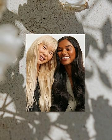 Botanical background with two women wearing luxy hair extensions