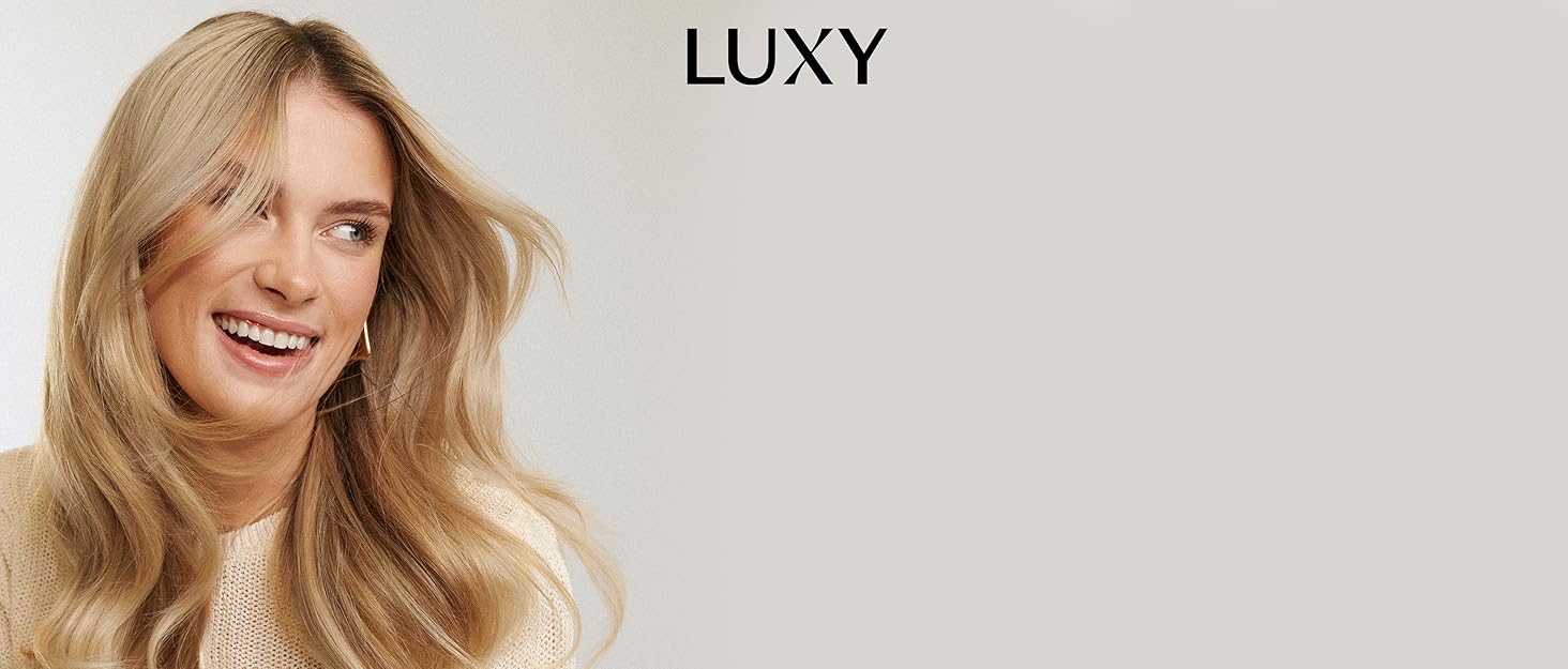Woman wearing Luxy Hair dimensional beige blonde seamless clip-ins