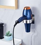 Wall-mounted hair dryer holder in metallic finish. Blue and silver hair dryer stored in the circular holder attached to a white wall.