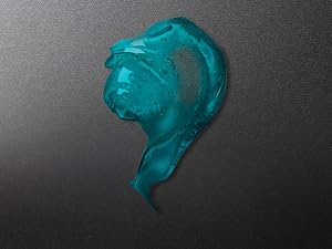 Blue gel spread across dark gray background.