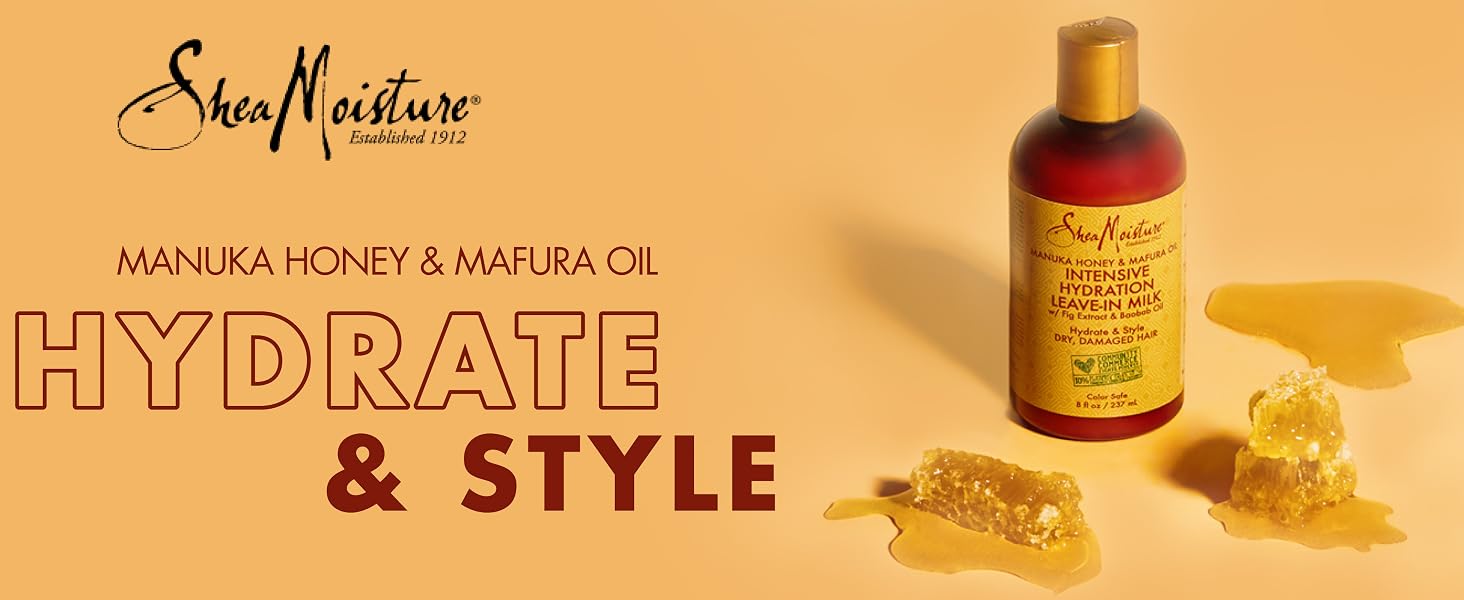SheaMoisture leave-in milk bottle with honeycombs on a light orange background.