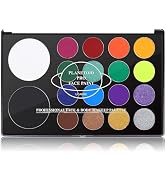 Makeup palette featuring several colored eyeshadow pans arranged in rows, showing various bright and neutral shades.