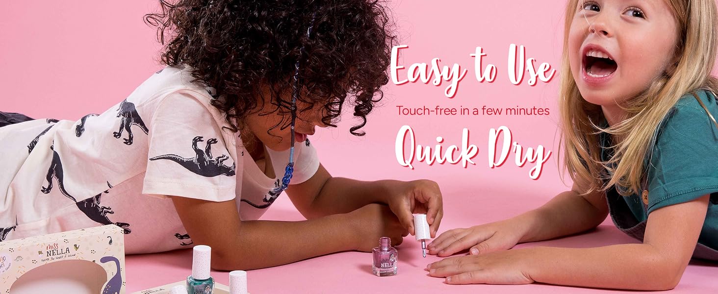 a girl is painting a nail polish on her nails