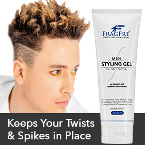 Young white boy with spike hairstyle posing with a tube of FragFre men hair styling gel firm hold